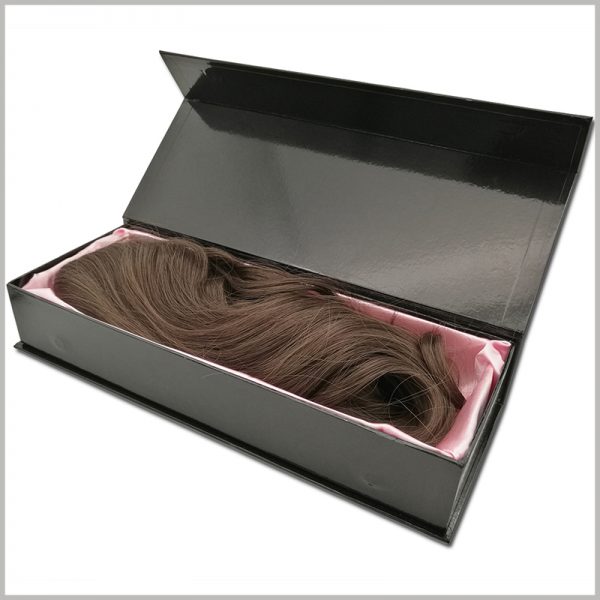 black hard cardboard boxes for wigs packaging.The inside of the boxes has a pink silk scarf for decoration and can protect the wig