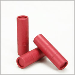 red small empty lipstick tube packging boxes.The lipstick package presents a unique visual effect because the red fine-grained imitation cloth paper is used as the paper laminate.
