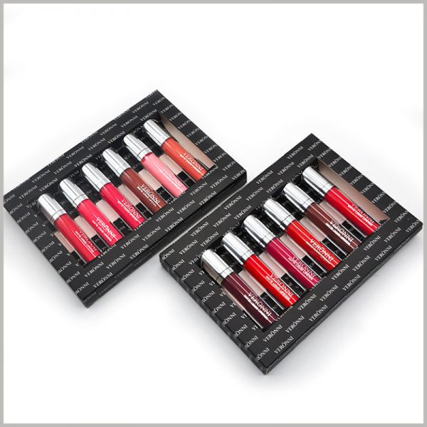 Black lip gloss packaging hold six bottles. Customized lip gloss packaging uses internal cardboard to fix the lip gloss to avoid shaking of the lip gloss, which is beneficial to the stability of the product.