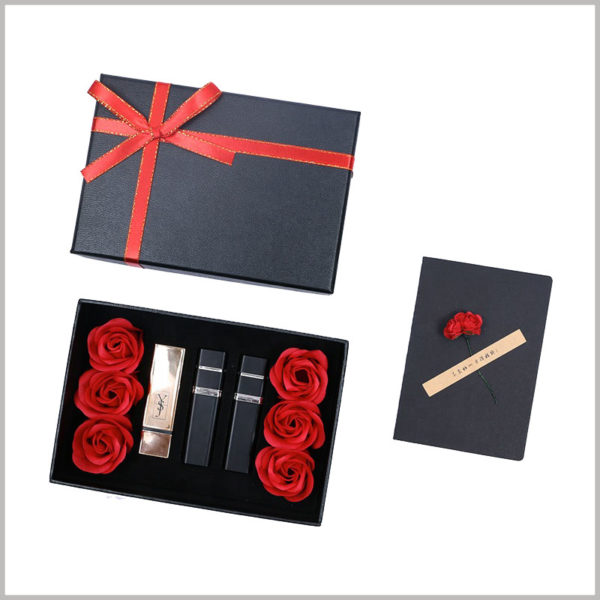Black lipstick gift boxes with flowers. The top of the black cardboard gift box uses narrow red silk as gift bows, making lipstick gifts even more important.