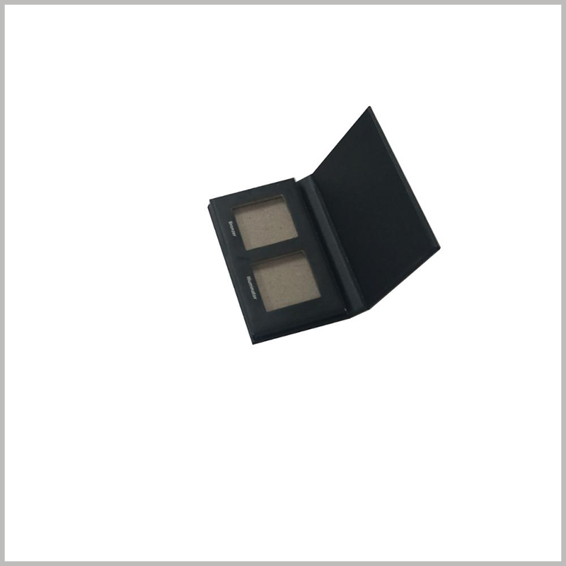 Black small cardboard boxes for two-colors eyeshadow packaging. The eyeshadow palette packaging takes up very little space and can be put in a pocket, purse or handbag to carry and use with you.