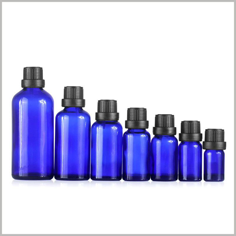 Blue essential oil bottle with with black flat cap. We can provide you with essential oil bottles in various capacities for a quick selection.