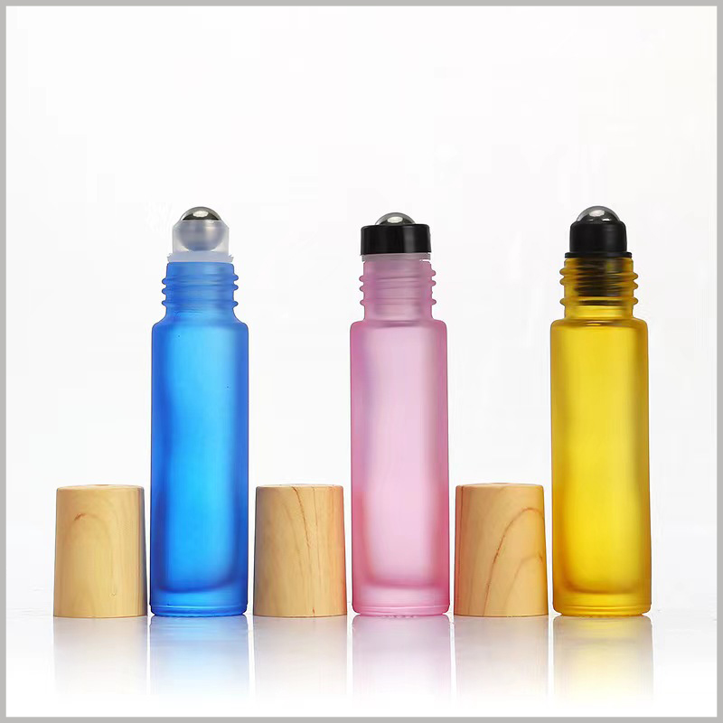 Color essential oil roller bottles wholesale. Essential oil bottle steel ball plastic holder, there are a variety of options, transparent and black.