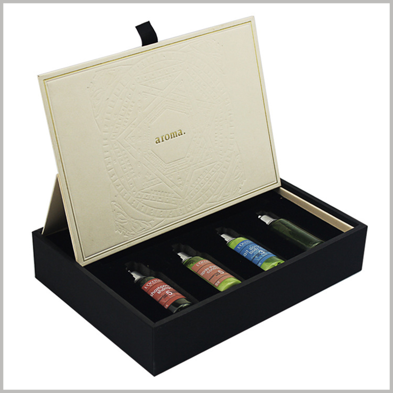 Creative packaging for essential oils of 4 bottles. The interior of the customized essential oil package has black flocking EVA, which can firmly hold the fragile essential oil glass bottle.