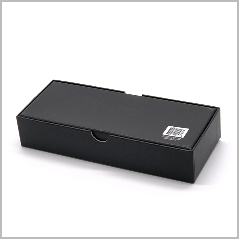 Custom Black small cardboard boxes with printing. A barcode is printed on the bottom of the customized black packaging to identify the authenticity of the product.