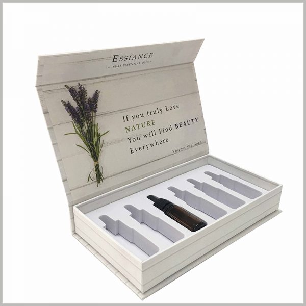 Custom white cardboard boxes for essential oil packaging of 6 bottle.The inside of the packaging cover can be printed with seditious promotional slogans, which will play a positive role in the use of the product.