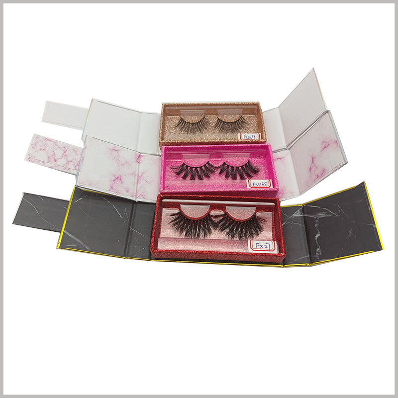 Double open Eyelash extension packaging boxes wholesale. The inside of the false eyelashes packaging has blister to fix the product, which is very good for the display of the product.