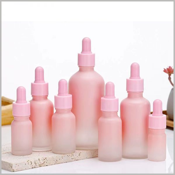 Gradient Pink glass dropper bottles for essential oil. The stylish essential oil bottle design can satisfy all girls' fantasies about pink, which is very helpful for product sales.