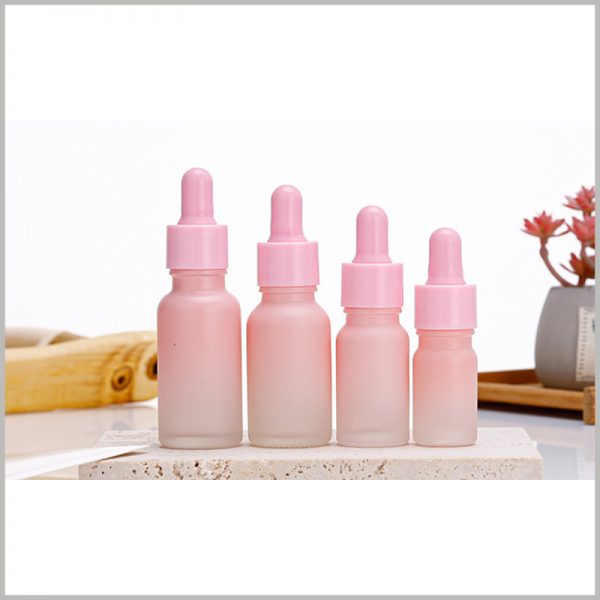 Gradient Pink glass dropper bottles wholesale, with a variety of essential oil volumes to choose from to meet different needs.