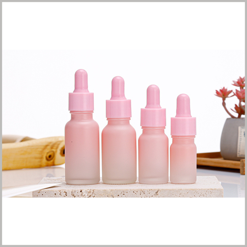 Gradient Pink glass dropper bottles wholesale, with a variety of essential oil volumes to choose from to meet different needs.