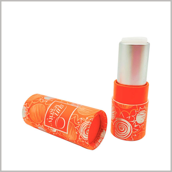 Orange packaging for sunscreen lipstick tube empty. The customized paper tube packaging has unique printed content, and product promotion or customer understanding plays an important role in the product.