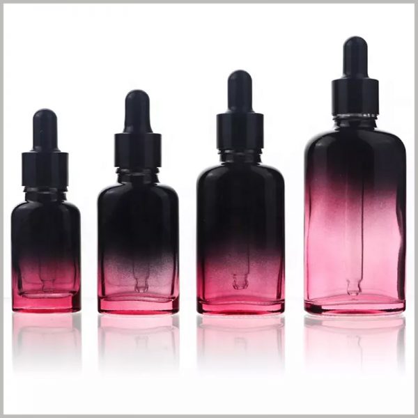 Oval essential oil dropper bottles with color, black and rose to enhance the liquid's light sensitivity and protection.