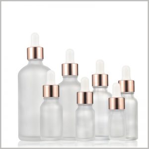 White Frosted essential oil dropper bottles with rose cover. The rose gold ring and white rubber cap make the essential oil bottle more popular.