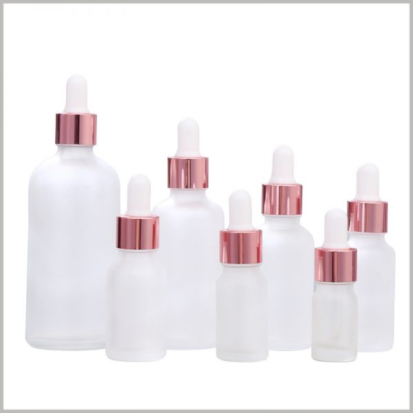 White Frosted essential oil dropper bottles with rose ring cover
