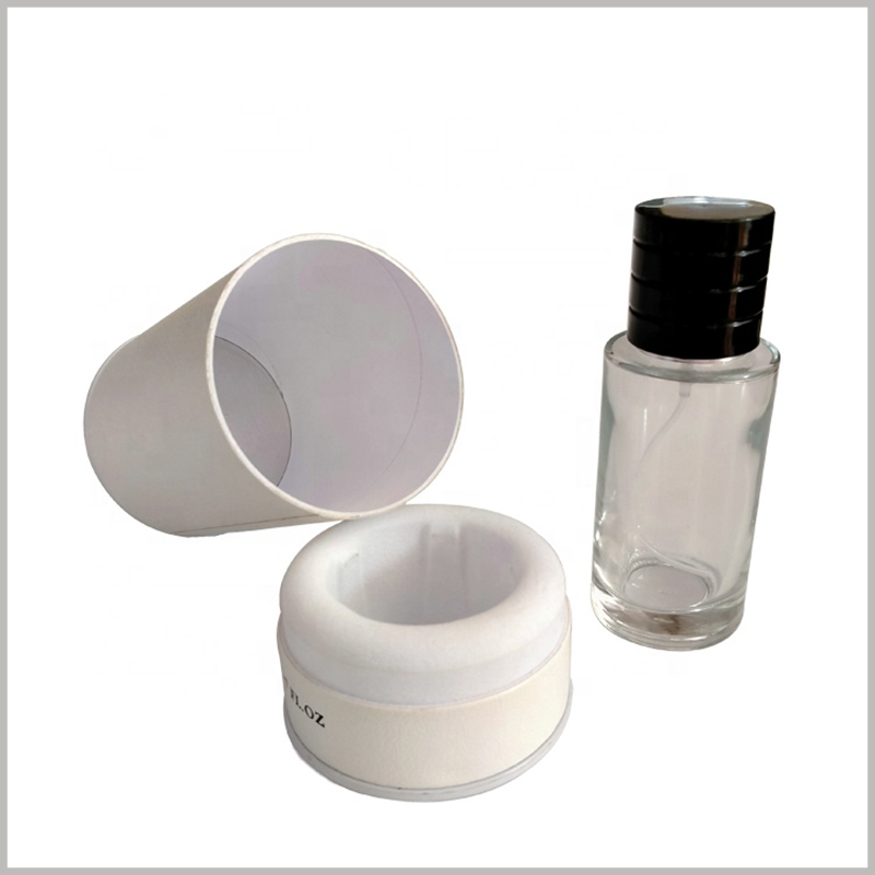 White paper tube for perfume packaging. The cardboard tube packaging is very sturdy and durable, and will not be easily deformed and damaged even if it is squeezed from the outside.