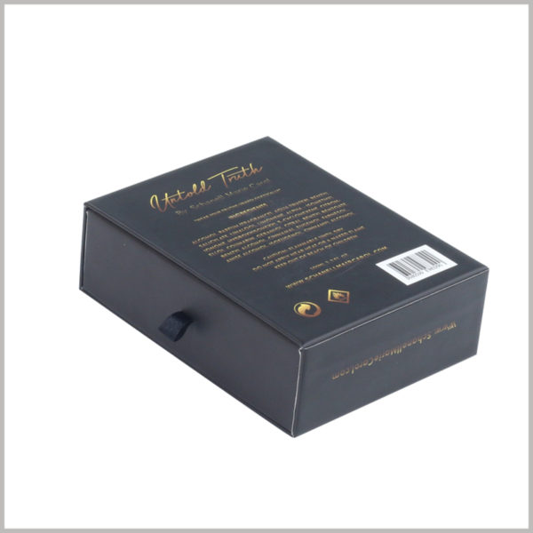 Custom black cardboard boxes for perfumes packaging. The detailed product information in gold lettering on the back of the black packaging will facilitate the promotion of the product.