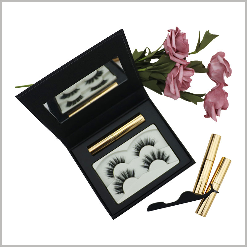 black eyelash packaging box with mirror. There is a white blister inside the customized eyelash packaging as an insert to fix 2 pairs of false eyelash products.