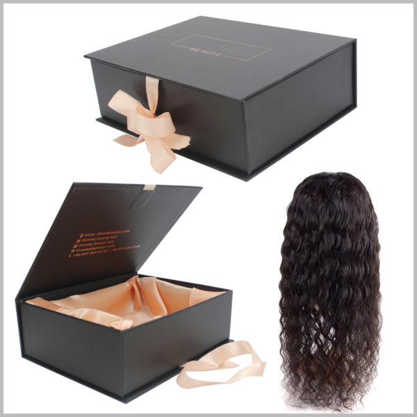 black large gift boxes for hair extension packaging.The outer box is a book-type box with a pink ribbon on the outside.