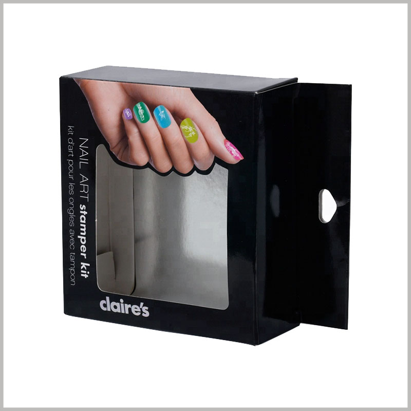 custom black packaging with windows for nail art stamper kit. The protruding paper part on the top of the cosmetic packaging box can become a hook, which is conducive to the display of products on the shelf.