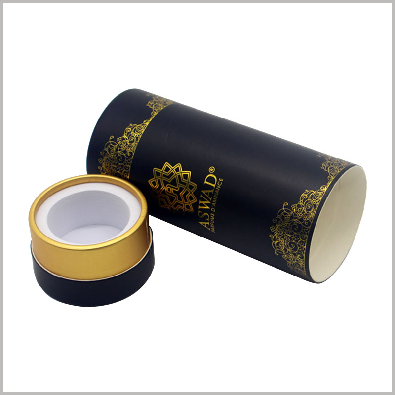 black round cardboard boxes for perfume packaging. A white EVA ring with a thickness of 1 cm is used as the base of the paper tube packaging box for fixing perfume glass bottles.