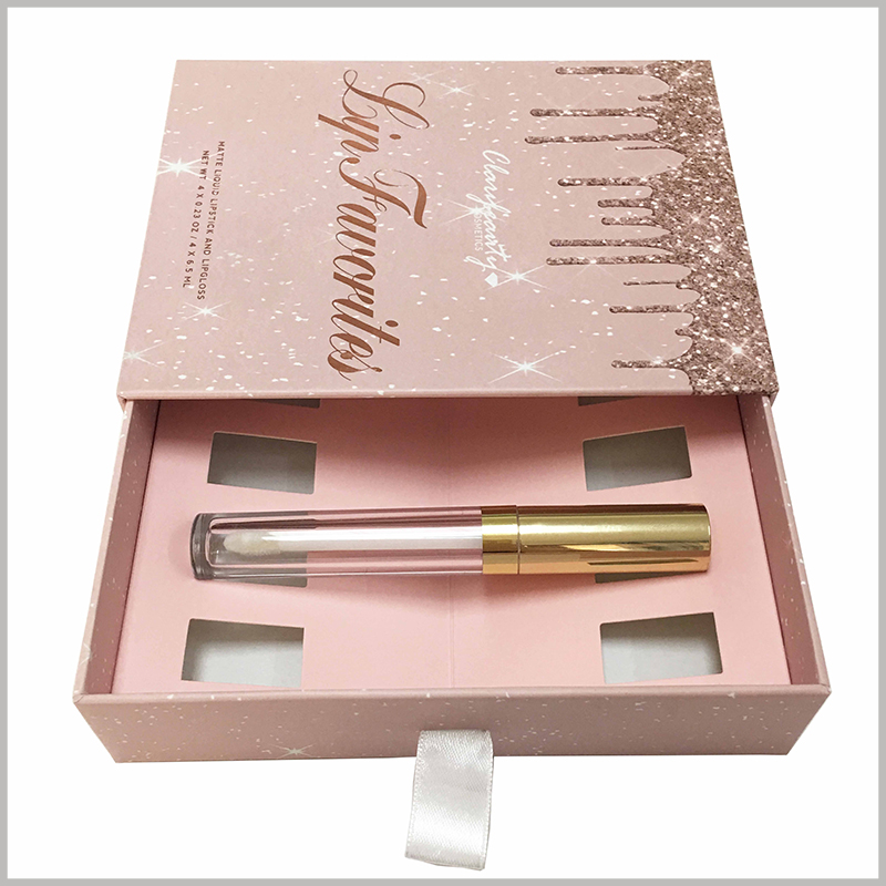 cardboard boxes for cosmetic lip gloss packaging. The inside of the cardboard drawer boxes has pink inner card packaging to fix 0.23 Oz lip gloss products.
