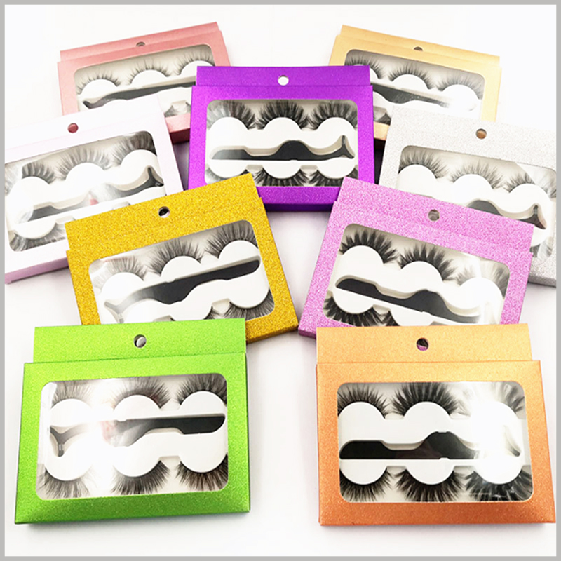 cheap Eyeslash packaging with window for 3-pair pack. The shiny eyelashes package is provided with a hook part, which can hang false eyelashes on the shelf for display.
