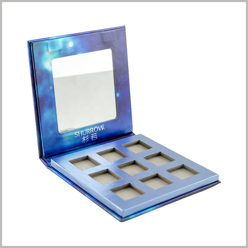 custom 9 colors eyeshadow palette box packaging with mirror. Nine eye shadow trays with different colors are embedded inside the eye shadow packaging.