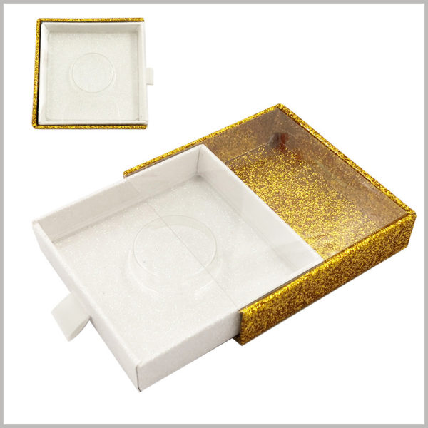 custom Glittering square cardboard drawer eyelash boxes with windows. The shiny gold cardboard is used as the outer box of drawer packaging, which improves the luxury of false eyelash products.