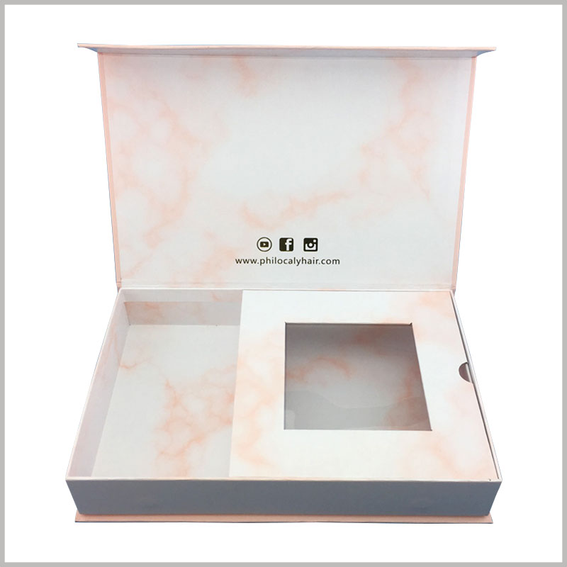 custom cardboard boxes for weave hair packaging box. The cardboard divides the interior space of the pink package into two separate small spaces, which can accommodate two different wigs.