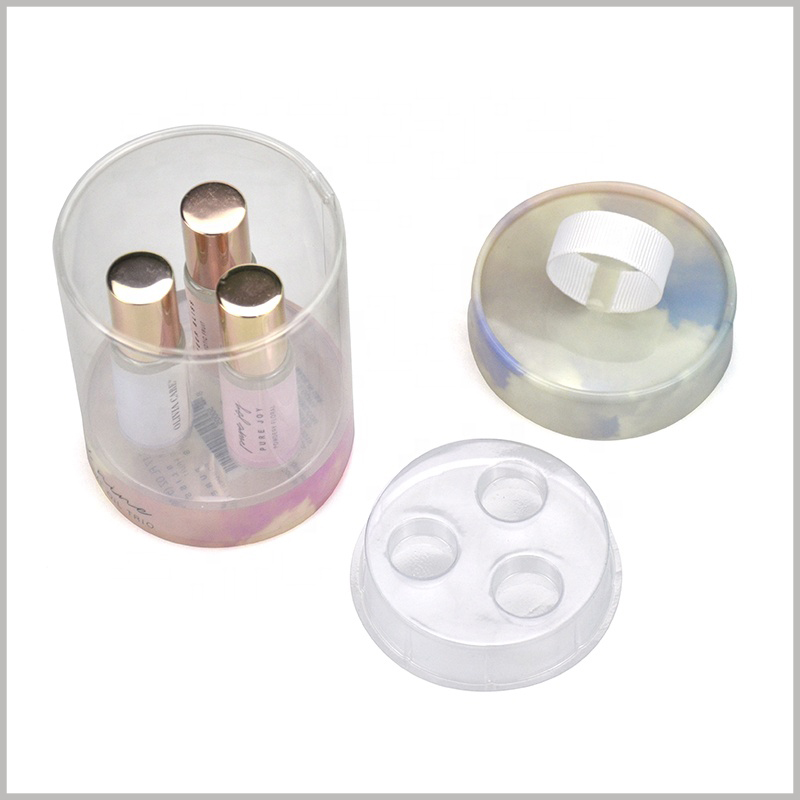 Custom clear plastic tube packaging for perfume boxes. At the top and bottom of the tube packaging, blister is used as an insert to fix the entire set of perfume glass bottles.