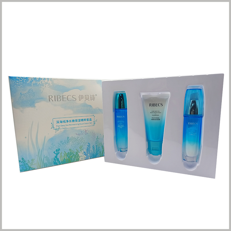 custom foldable skincare products packaging with blister insert. Three bottles of vibrant color skincare products are fixed by blister and well displayed to consumers.