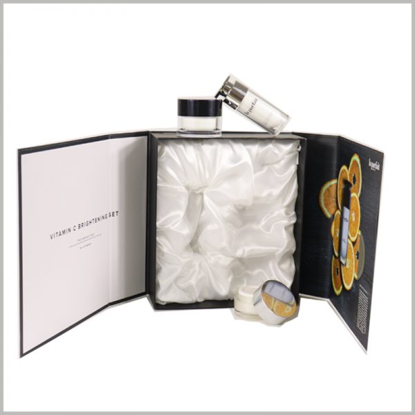 Custom makeup boxes with silk insert for skincare set. The skincare products are packaged in a double-opening style, which improves the packaging experience.