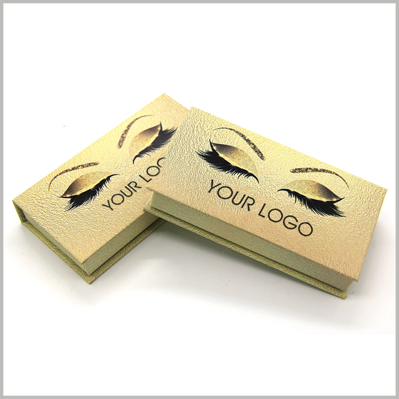 luxury gold cardboard eyelashes boxes packaging.Creative eyelash packaging design, printing eyes, eyelashes and eyebrows on special gold cardboard, is like a pair of eyes in custom boxes, making the packaging creative and attractive.