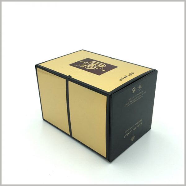 luxury large gold cardboard boxes for perfumes packaging.Detailed product information is printed in white font on the black bottom of the cardboard boxes.