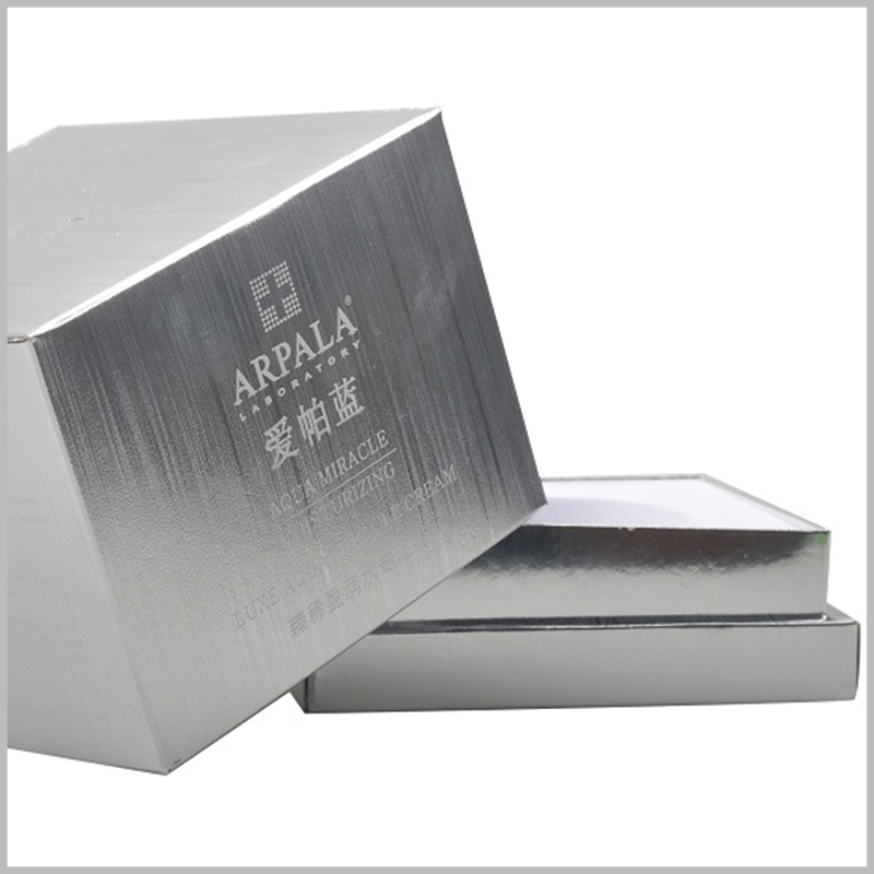 luxury silver packaging for skincare light cream. Silver cardboard covers the entire packaging surface, giving skin care products a luxurious visual experience.