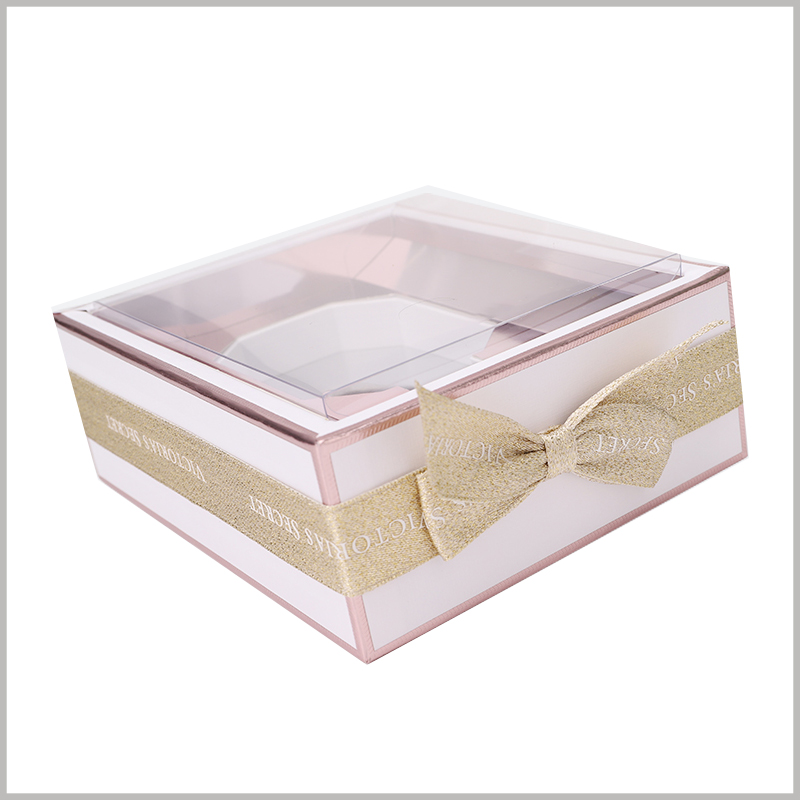 perfume gift boxes with gift bows. The exterior of the customized perfume package uses shiny silk as gift bows, and the perfume is more valuable as a gift.