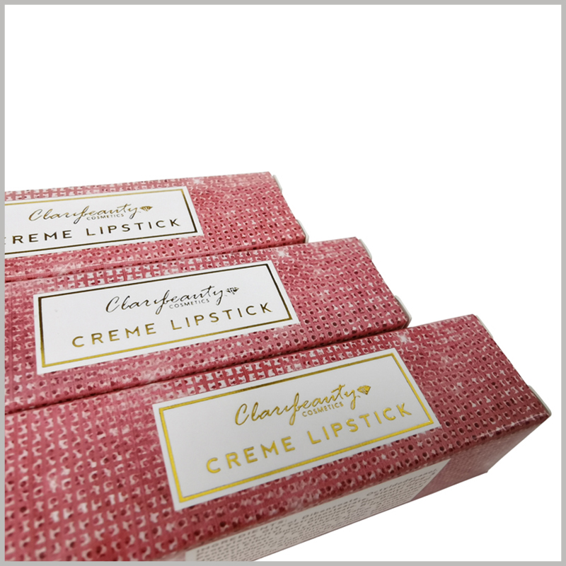 pink cosmetic boxes for creme lipstick packaging. In order to promote the product and brand, bronzing printed the relevant information of the brand and product on the front of the box.