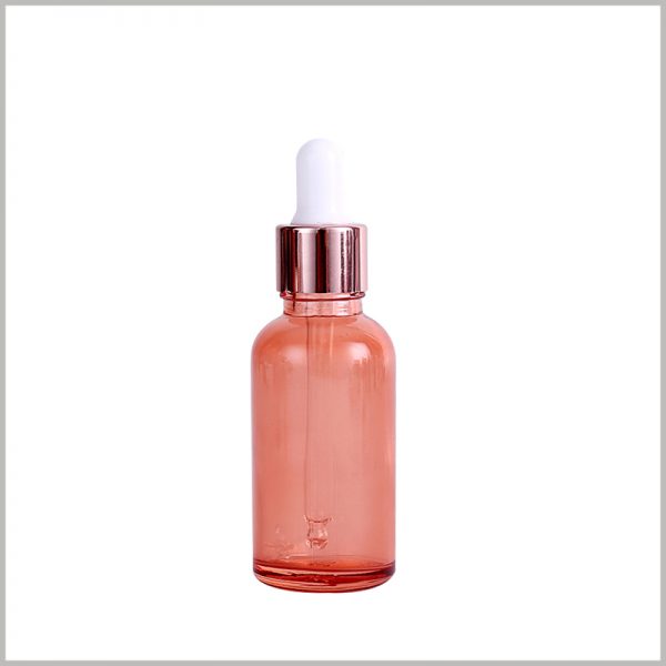 pink essential oil bottles with gold circle wholesale