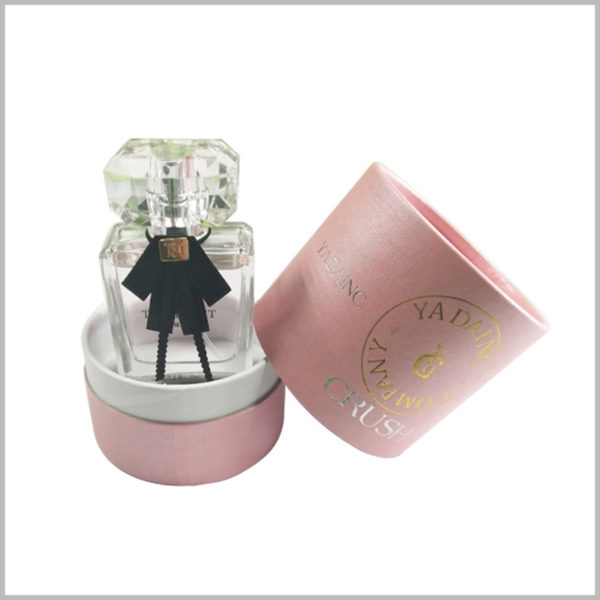 pink small cardoard tube cosmetic packaging for perfume,The background color is a girly champagne pink, which looks pink and high-grade overall.