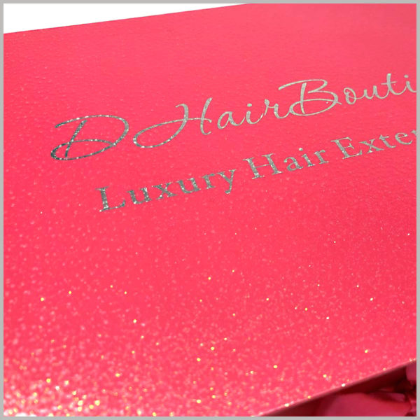 red gift box for hair extensions packaging. The product name and brand name use shining text, which can better reflect the high-end and value of the product.