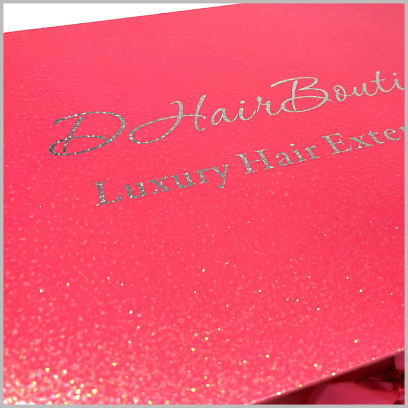 red gift box for hair extensions packaging. The product name and brand name use shining text, which can better reflect the high-end and value of the product.