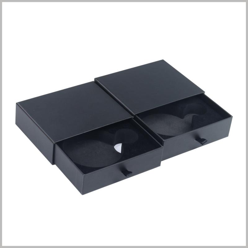 small black cardboard drawer boxes for perfume bottle packaging.A pull ring is set on the edge of the cardboard drawer box, and the pull ring is made of black silk cloth.