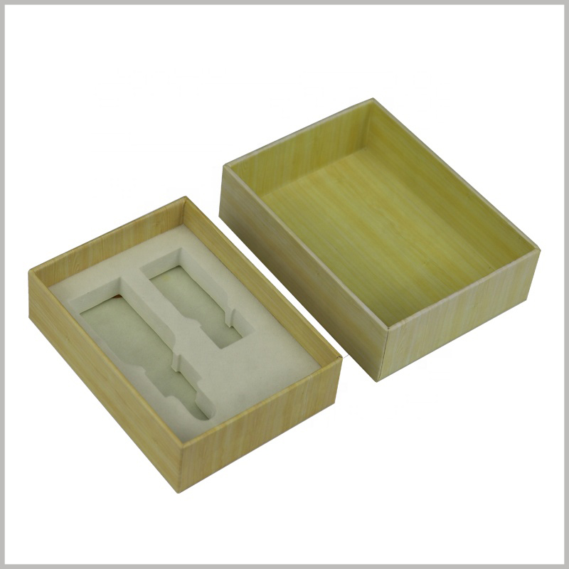 small cardboard packaging for essential oil boxes set. The customized essential oil package can hold two different types and capacities of essential oils, using specific EVA to fix the product.