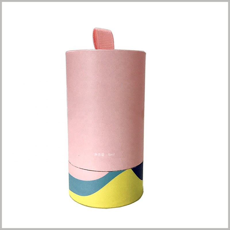 small paper tube boxes for single nail polish packaging. The customized nail polish packaging uses a paper tube structure, and cute pink is the main color theme of the packaging design.