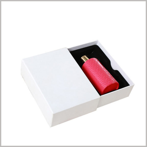 white drawer gift boxes for shampoo packaging. The interior of the custom packaging box uses black flocking blister as an insert to secure the shampoo bottle.